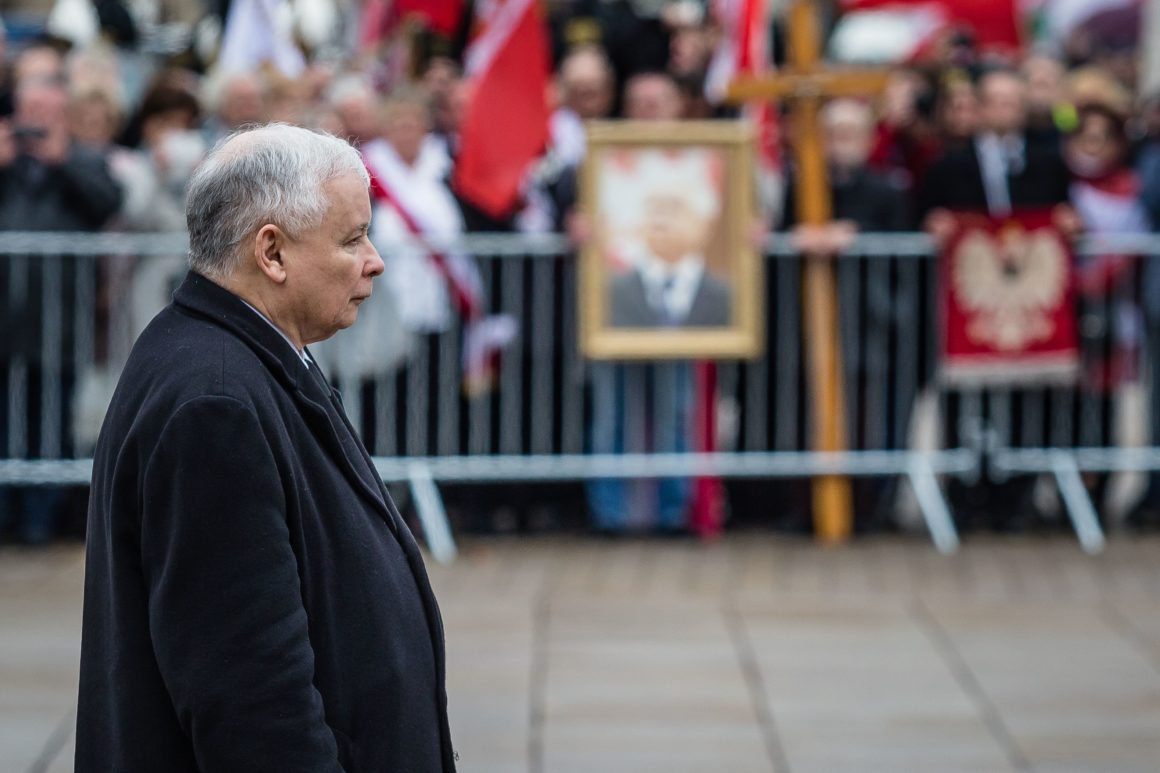 Jaroslaw Kaczynski, leader of Law and Justice party (PiS) and twin brother of late Polish president Lech Kaczynski (unseen), his co-workers and supporters attend a ceremony marking the sixth anniversary of the presidential plane crash in Smolensk, in front of the presidential palace in Warsaw, Poland, on April 10, 2016. / AFP / AFP PHOTO / WOJTEK RADWANSKI (Photo credit should read WOJTEK RADWANSKI/AFP/Getty Images)
