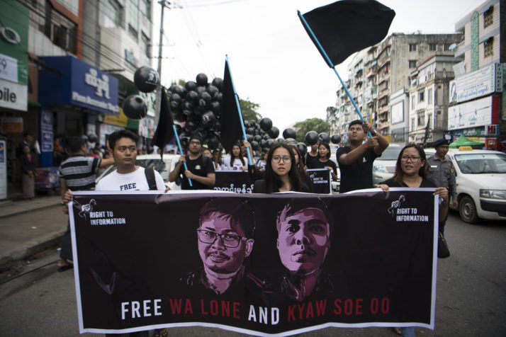 Supporters of detained Myanmar journalists Wa Lone and Kyaw Soe Oo march during a rally in Yangon demanding for their release on September 1, 2018. - The two Reuters journalists in Myanmar accused of breaking a state secrets law while investigating a massacre of Rohingya Muslims face verdict on September 3. (Photo by - / AFP) (Photo credit should read -/AFP/Getty Images)